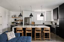 Stylish 3-Bed Retreat, Rooftop, Parking, Sleeps 10  |  Ensuite Baths, Bunk Room, Gourmet Kitchen, Cozy Living Space, Rooftop Views & Fire Table, Near Downtown, Distilleries & Marathon Village, 24 Hr Hospitality - Image 4