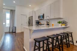 Hillsboro Village Retreat, Garage, Rooftop Deck,  Sleeps 12, Sophisticated Open Living & Gourmet Kitchen, Smart TVs, Pet-Friendly w/ Private Garage, Walk to Vanderbilt, Minutes to 12 South & Broadway, 24/7 Hospitality - Image 4