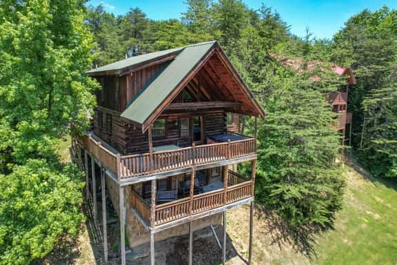 Dreamy Forest Home, 2 Decks, Hot Tub, Outdoor Pool | 10 Mins to Broadway, Perfect for Groups, 24 Hour Hospitality, Sleep 10 w/ Wraparound Deck, Scenic Views & Access to Resort Pool,  Near The Parkway, Tanger Outlets & Dollywood - Image 1