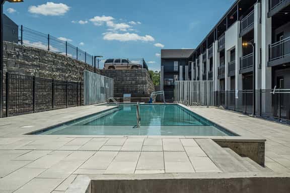 Long Term Condo with Pool, Gym, Balcony, Parking   |   Sleeps 6, King Suite + Sleeper Sofa,  Minutes to Downtown & Five Points, Perfect for Long Stays and Remote Work,  24 Hour Hospitality - Image 1