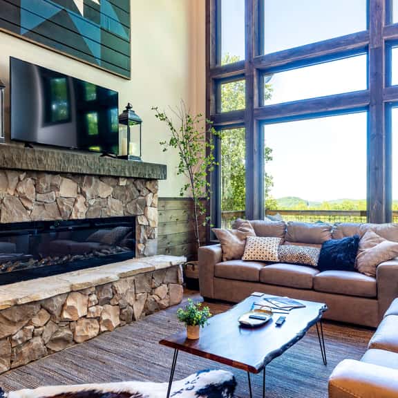 Luxury Smoky Chalet, Indoor Pool, Hot Tub, Theater,  Sleep 12 in 4 King Suites, Indoor Fireplace, Outdoor Fire Pit, Game Loft & Scenic Views, 20 Min to Dollywood, The Island & Parkway, Dog-Friendly, 24 Hr Hospitality - Image 1