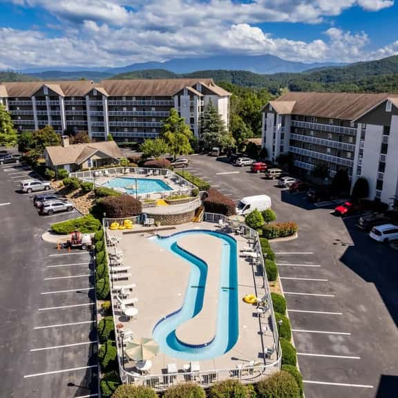 King Suites, Outdoor Pool+Lazy River Near Parkway  |  Covered Patio, Two King Suites and Queen Sleeper Sofa, Near Dollywood & Smoky Mountains, 24/7 Hospitality, Cozy Living Space - Image 1