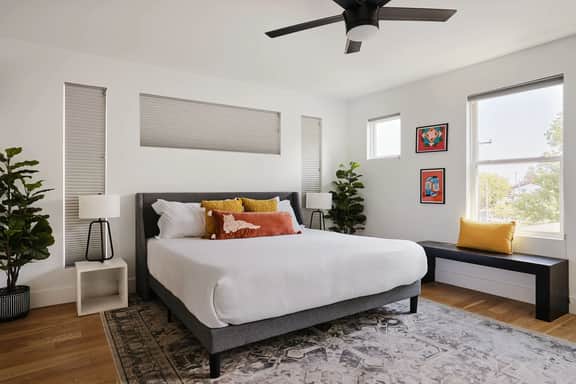 Stylish 3-Bed Retreat, Rooftop, Parking, Sleeps 10  |  Ensuite Baths, Bunk Room, Gourmet Kitchen, Cozy Living Space, Rooftop Views & Fire Table, Near Downtown, Distilleries & Marathon Village, 24 Hr Hospitality - Image 3