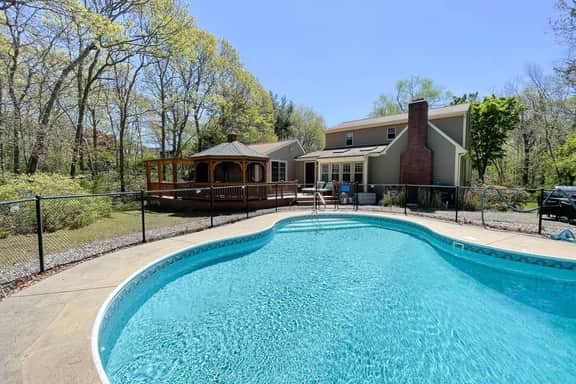 Spacious Retreat With Pool, Game Room & Fireplace | Sleeps 10 | Backyard Oasis & Screened Gazebo | Family-Friendly Getaway | 24/7 Hospitality - Image 4