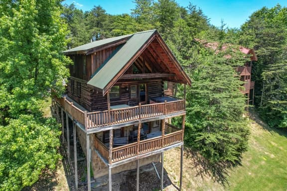 Dreamy Forest Home, 2 Decks, Hot Tub, Outdoor Pool | 10 Mins to Broadway, Perfect for Groups, 24 Hour Hospitality, Sleep 10 w/ Wraparound Deck, Scenic Views & Access to Resort Pool,  Near The Parkway, Tanger Outlets & Dollywood - Image 1