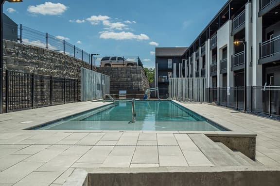 Long Term Condo with Pool, Gym, Balcony, Parking   |   Sleeps 6, King Suite + Sleeper Sofa,  Minutes to Downtown & Five Points, Perfect for Long Stays and Remote Work,  24 Hour Hospitality - Image 1